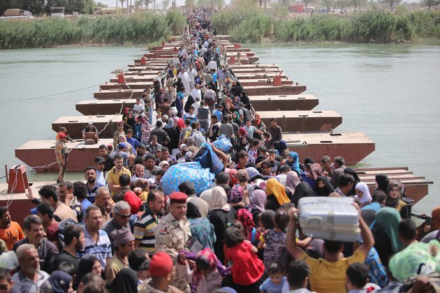 Avertisment ONU:  Va urma un aflux masiv de refugiați dinspre Irak