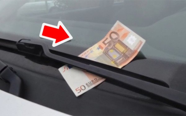 Şoferii, avertizaţi să nu coboare din maşină dacă observă o bancnotă de 50 de euro pe parbriz