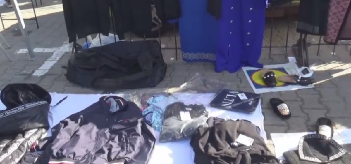 Ofereau spre comercializare haine contrafăcute, dar s-au ales cu dosare penale și marfa confiscată (VIDEO)